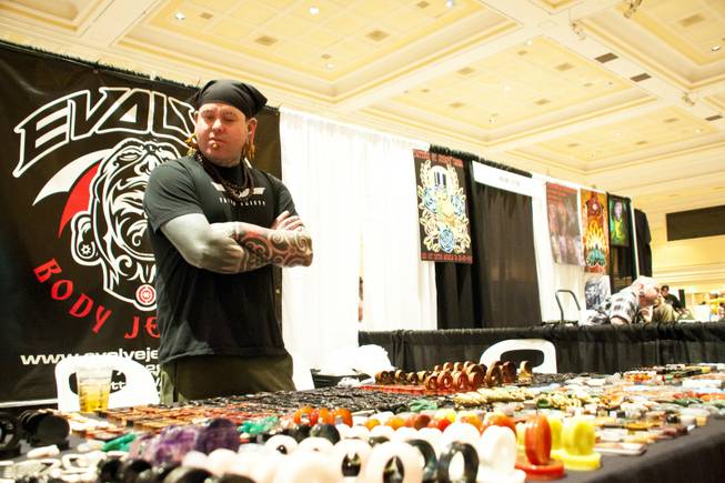John Durante of Evolve Body Jewelry Co. stands at his ...